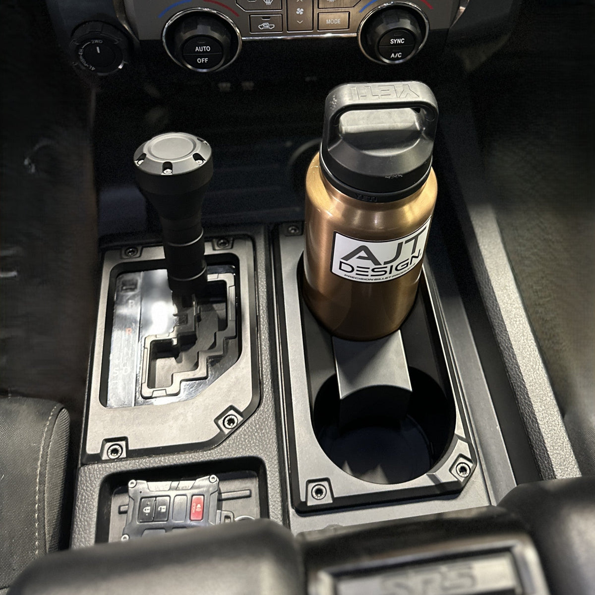 AJT Design v2 oversize cup holder for a 2014-2021 Toyota Tundra.