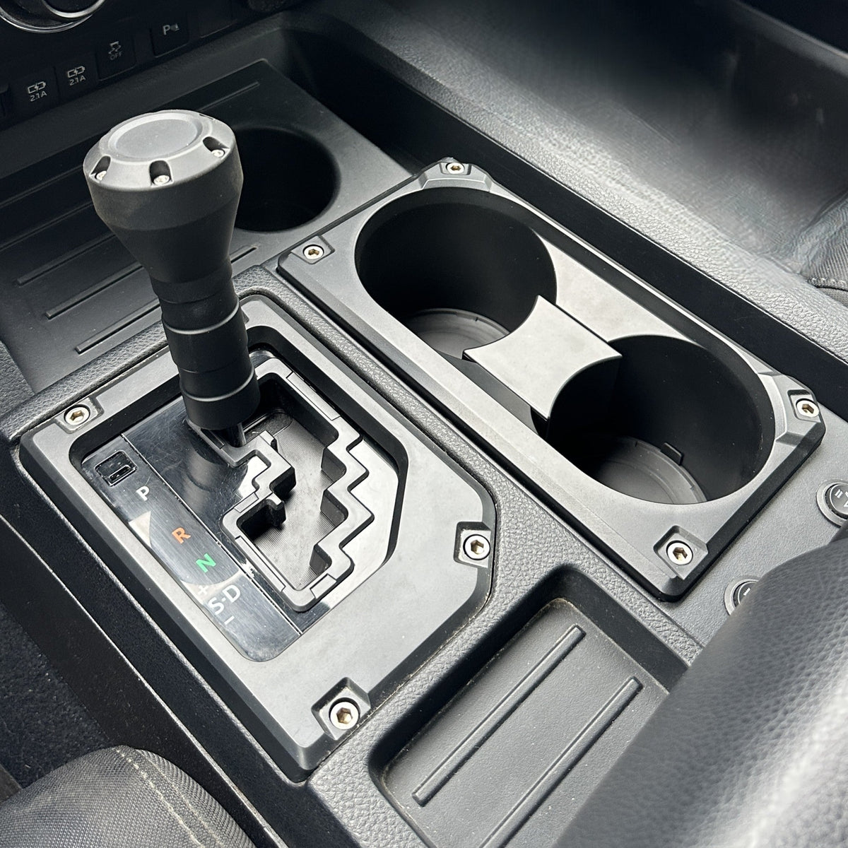 AJT Design v2 cup holder insert for a 2014-2021 Toyota Tundra.