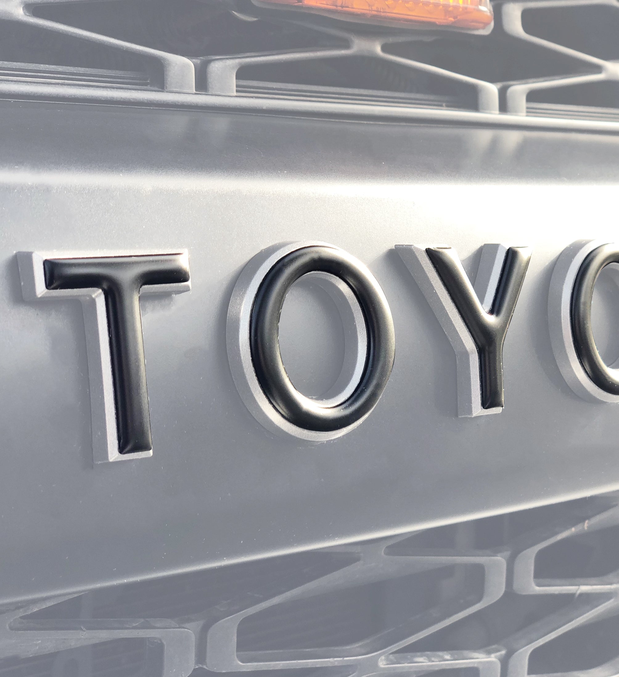 TUFSKINZ grille letter overlays on a 5th gen Toyota 4Runner