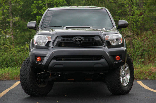 Lamin-X universal protective film applied to a fog light in amber.